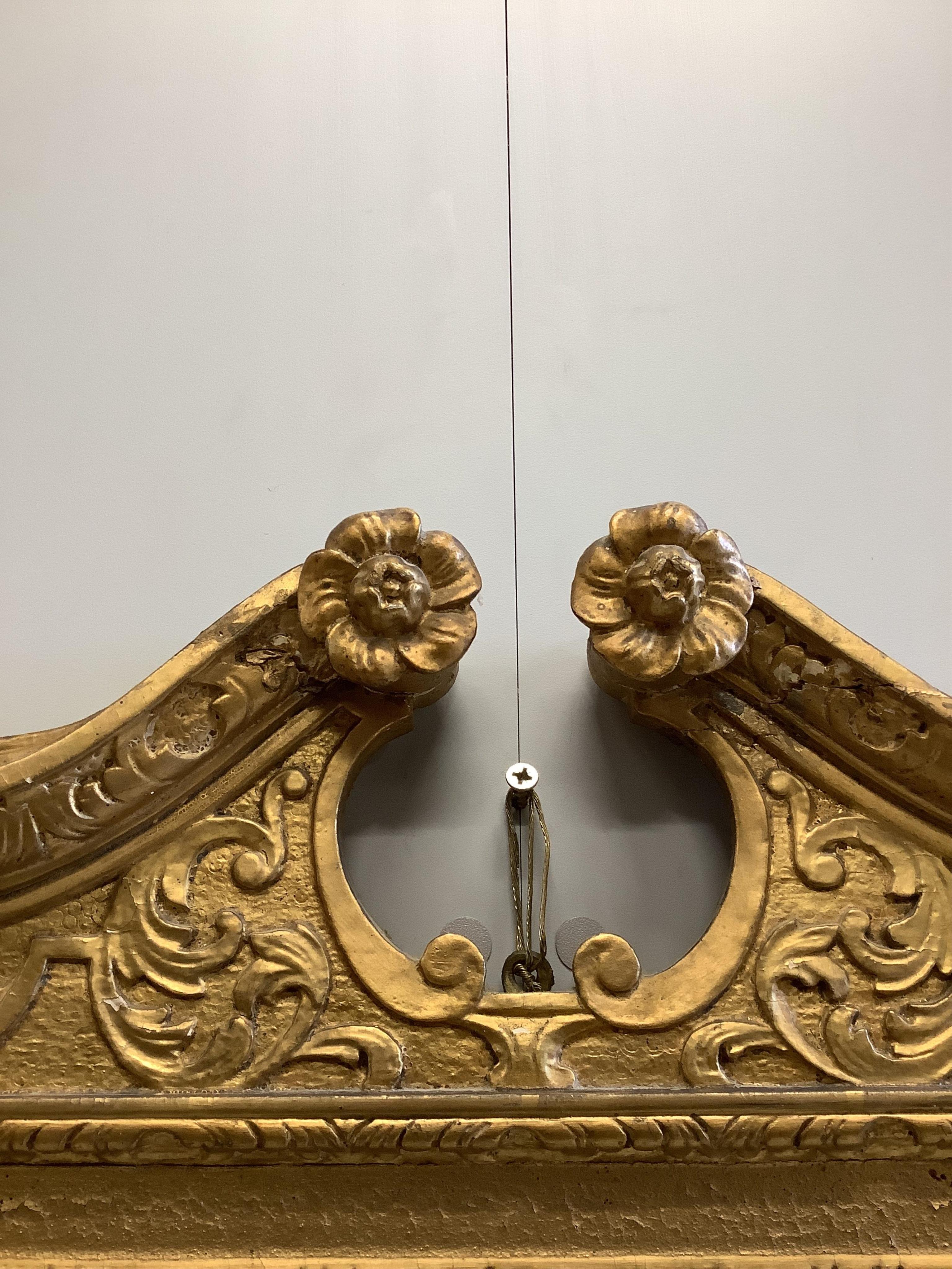 An Adam style giltwood and gesso wall mirror, width 61cm, height 108cm. Condition - fair to good